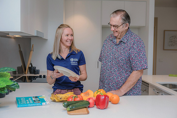 Staff helping with meal prep - Home care services with Wesley Mission Queensland