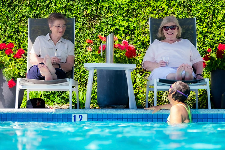 Rosemount Retirement Village - Friends relaxing in outdoor heated pool