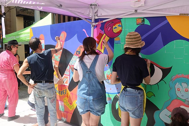 Wesley Arts live mural painting in Brisbane CBD