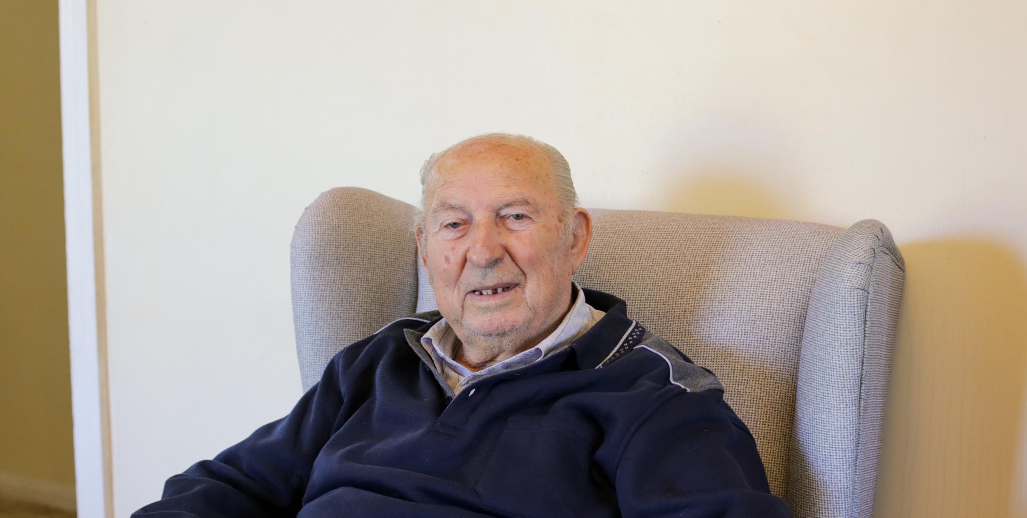 man sitting in chair